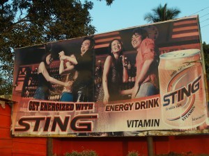 Billboard promoting energy drinks in Freetown, Sierra Leone