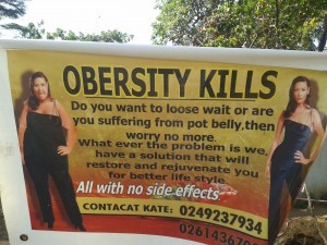 Billboard in Ghana promoting an undisclosed solution for obesity. Photo credit: Anna-Sarah Eyrich