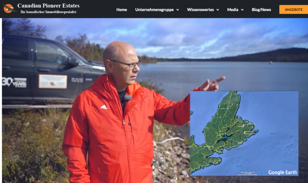 This photo shows Rolf Bouman in a video on the website of Canadian Pioneer Estates standing in front of a lake and wearing a red jacket.